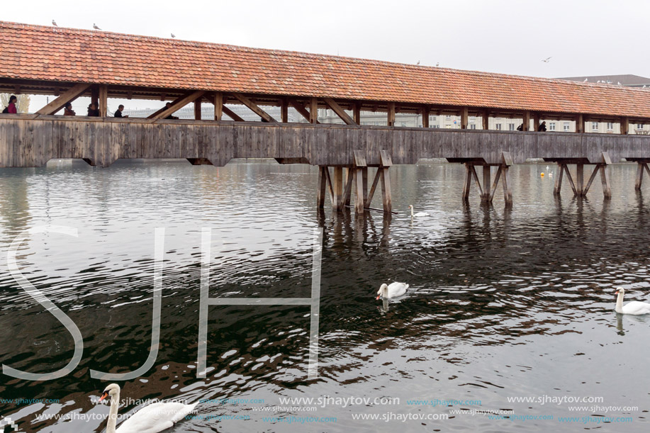 Foggy morning Chapel Bridge over Reuss River, Lucerne, Switzerland