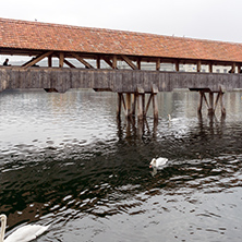 Foggy morning Chapel Bridge over Reuss River, Lucerne, Switzerland