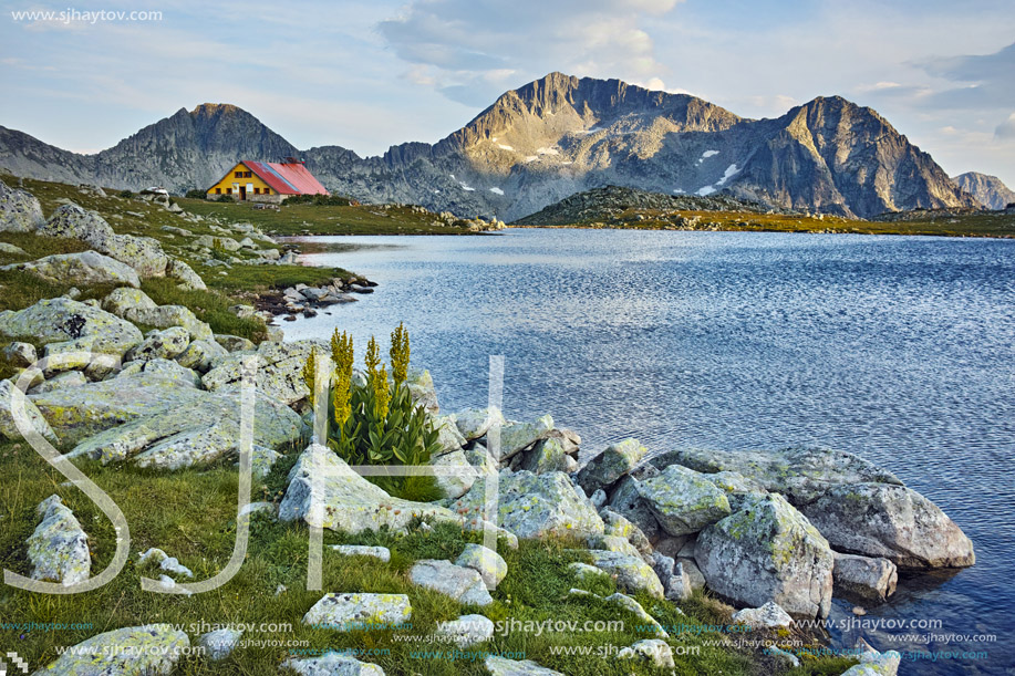 Last Ray of sun over Tevno Lake and Kamenitsa peak, Pirin mountain, Bulgaria