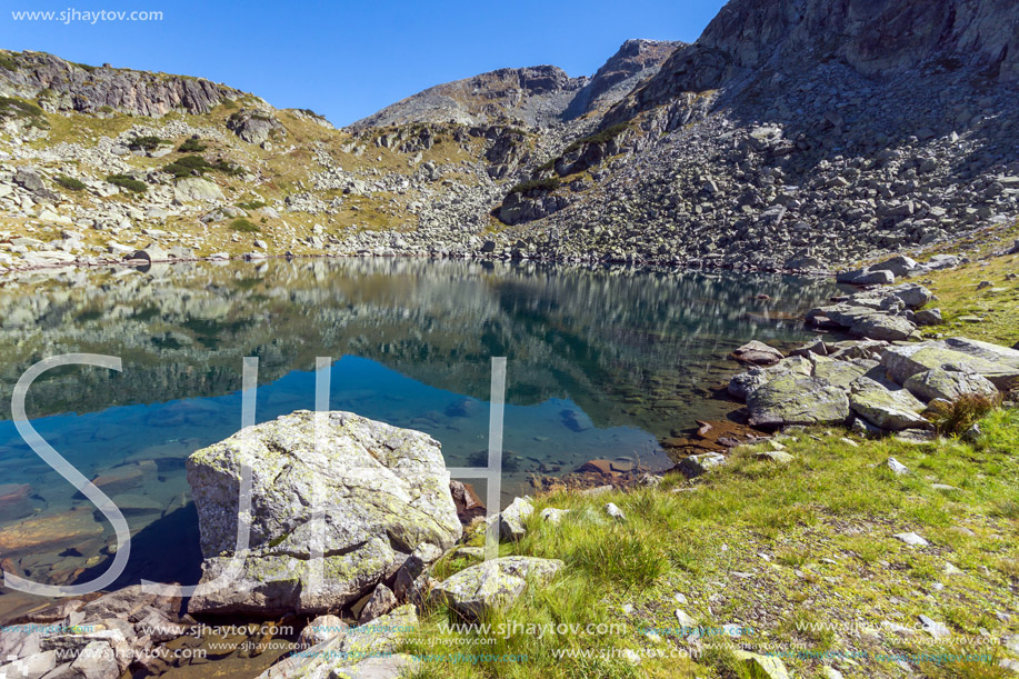Amazing panorama of Lake and reflection of Preokorets (Popova Kapa) peak, Rila Mountain, Bulgaria