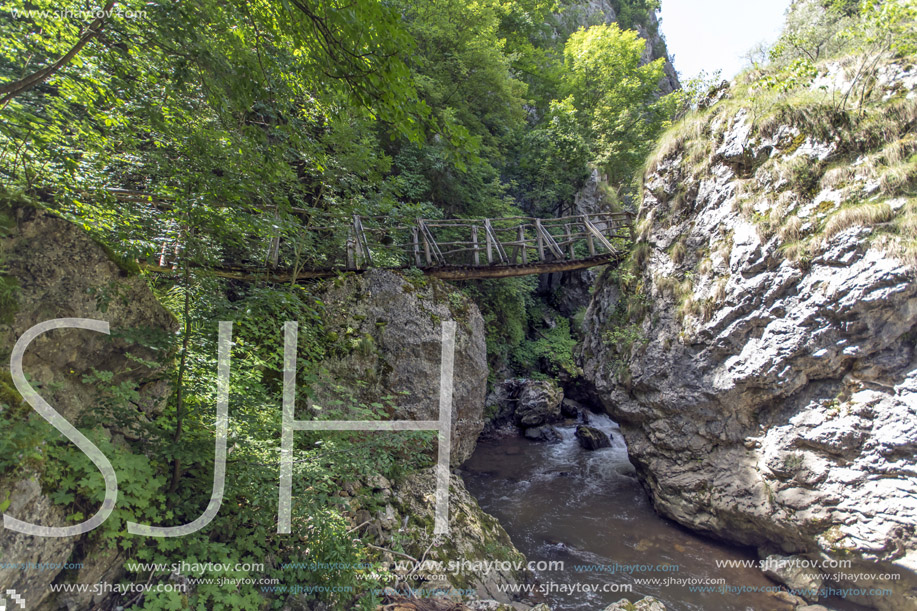Landscape with Wooden bridge over river, Erma River Gorge, Bulgaria