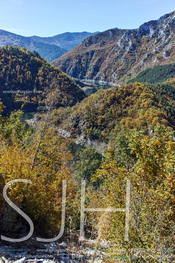 Panoramic view of Tsankov kamak Reservoir and Autumn forest, Smolyan Region, Bulgaria