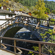 Autumn Landscape with Roman Bridge and old houses in town of Shiroka Laka, Smolyan Region, Bulgaria