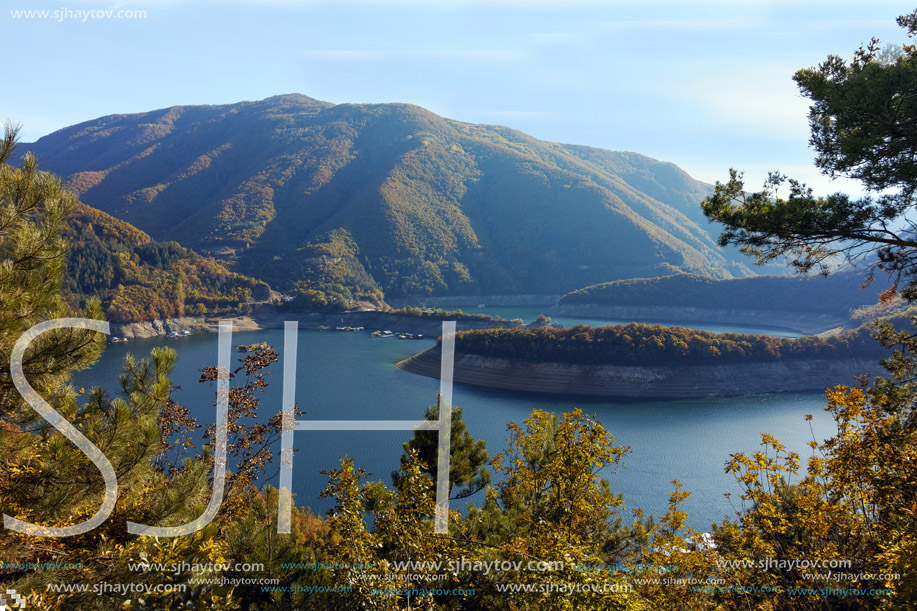 Autumn landscape of forest around Vacha (Antonivanovtsy) Reservoir, Rhodopes Mountain, Bulgaria