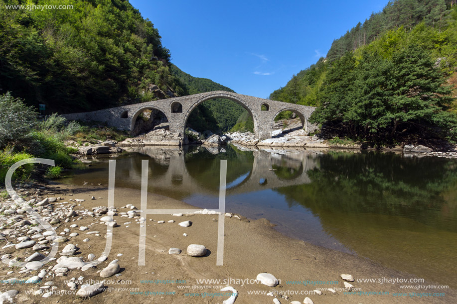 Amazing Reflection of The Devil"s Bridge in Arda river and Rhodopes mountain, Kardzhali Region, Bulgaria