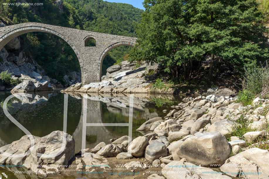 Amazing Reflection of Devil"s Bridge in Arda river and Rhodopes mountain, Kardzhali Region, Bulgaria