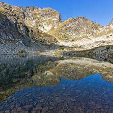 Stones in the water of Elenski lakes and Malyovitsa peak, Rila Mountain, Bulgaria