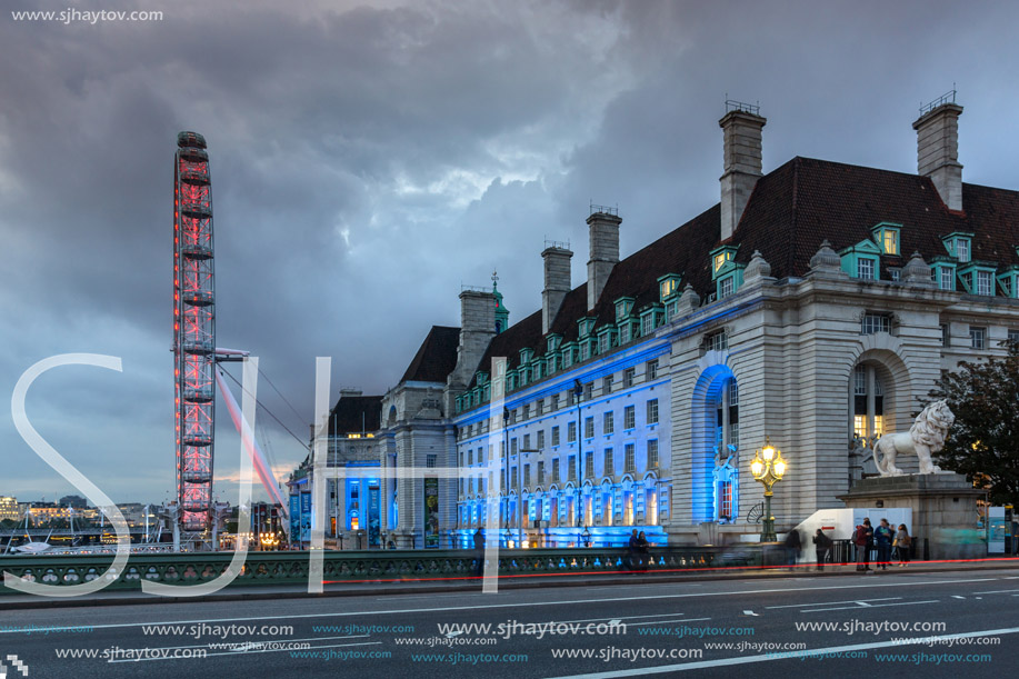 LONDON, ENGLAND - JUNE 16 2016: Night photo of The London Eye and County Hall from Westminster bridge, London, England, Great Britain