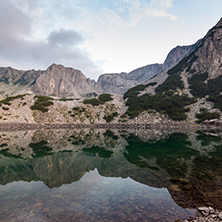 Sunset with Colored in red rock near Sinanitsa peak and  the lake, Pirin Mountain, Bulgaria