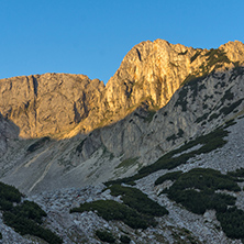Amazing Sunrise with Colored in red rock of Sinanitsa peak and  the lake, Pirin Mountain, Bulgaria
