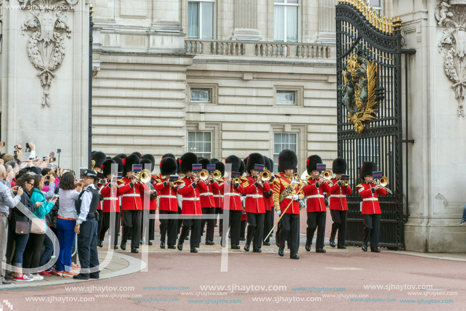 LONDON, ENGLAND - JUNE 17 2016: British Royal guards perform the Changing of the Guard in Buckingham Palace, London, England, Great Britain