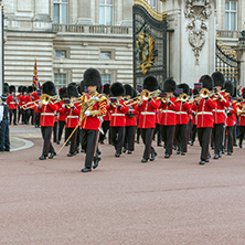 LONDON, ENGLAND - JUNE 17 2016: British Royal guards perform the Changing of the Guard in Buckingham Palace, London, England, Great Britain