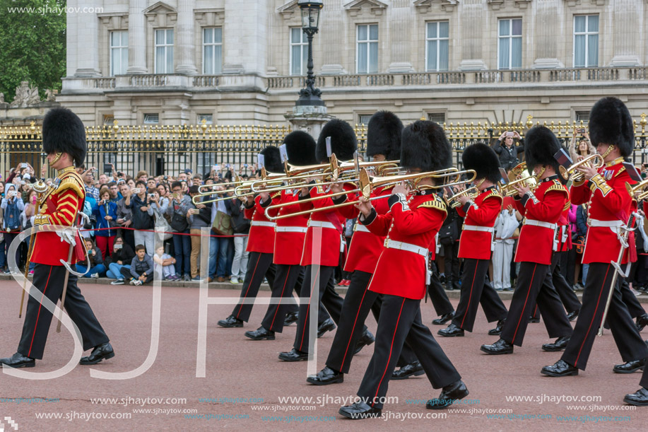 LONDON, ENGLAND - JUNE 17 2016: British Royal guards perform the Changing of the Guard in Buckingham Palace, London, England, Great Britain