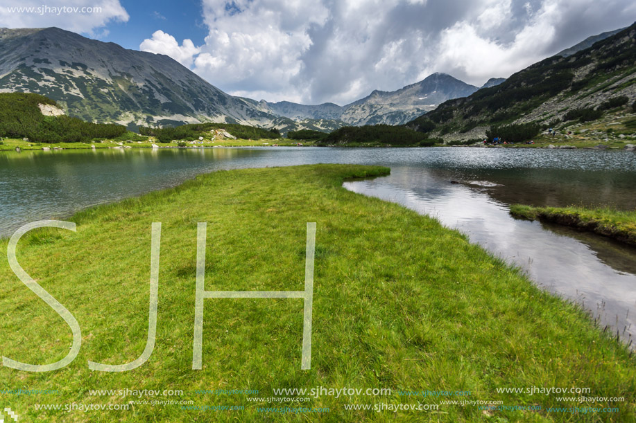 Amazing Panorama of Banderishki Chukar and reflection in Muratovo lake, Pirin Mountain, Bulgaria