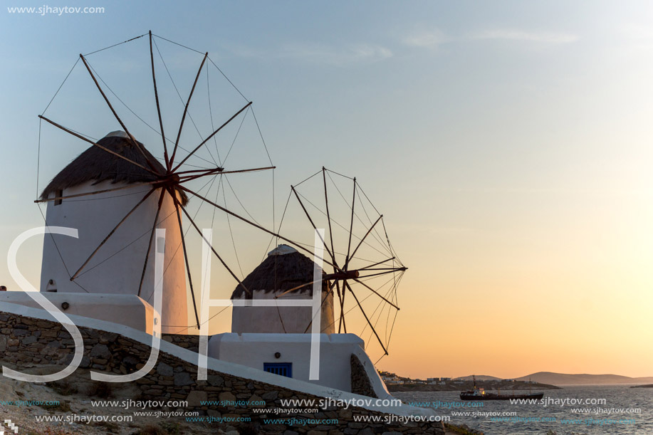 Amazing Sunset and White windmills on the island of Mykonos, Cyclades, Greece