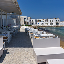 White house and Bay in Naoussa town, Paros island, Cyclades, Greece