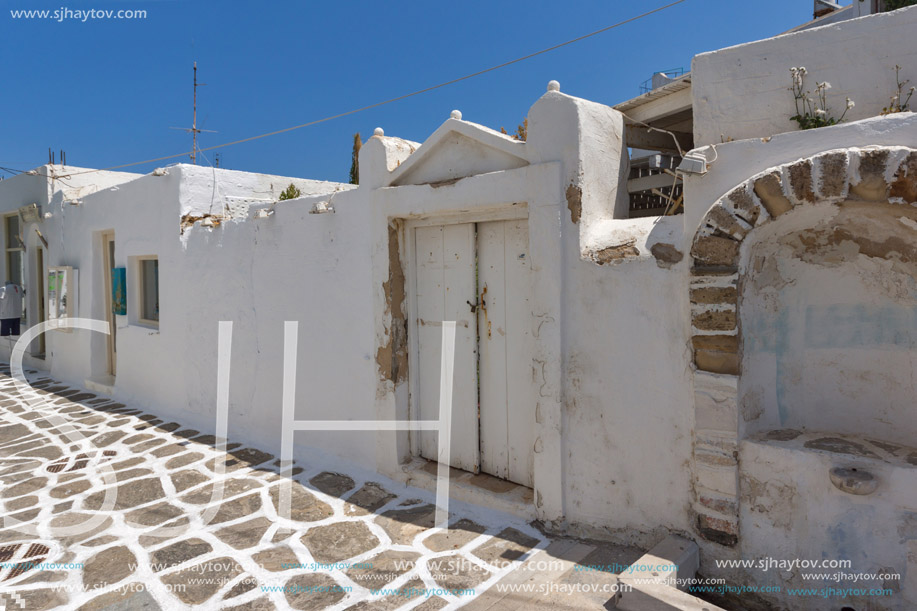 Old white house in Naoussa town, Paros island, Cyclades, Greece