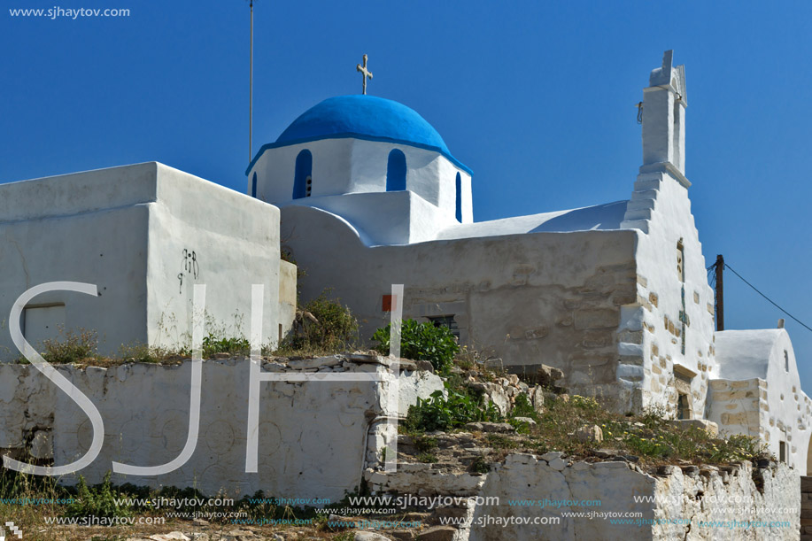 White chuch with blue roof in town of Parakia, Paros island, Cyclades, Greece