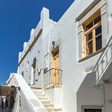 white houses with flowers in town of Parakia, Paros island, Cyclades, Greece