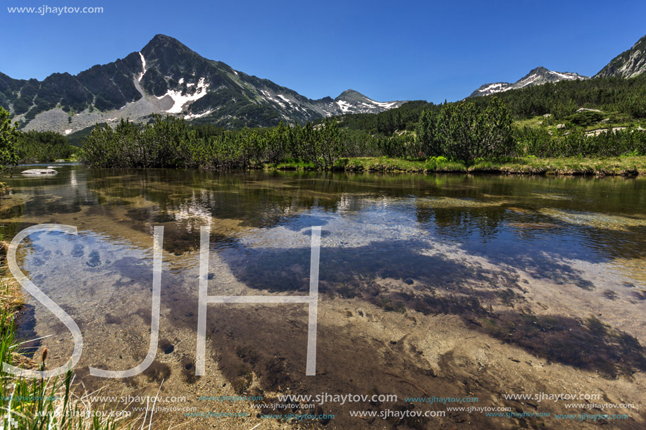 Landscape with Reflection of Sivrya peak in Banski lakes, Pirin Mountain, Bulgaria
