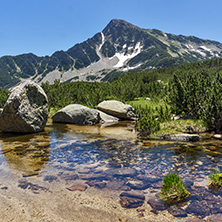 Landscape with Stones in the water of Banski lakes and Sivrya peak, Pirin Mountain, Bulgaria