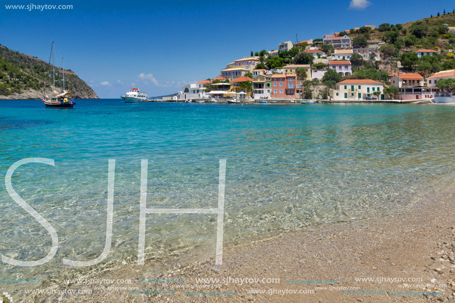 Clean waters of beach of Assos village and beautiful sea bay, Kefalonia, Ionian islands, Greece