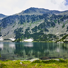 Clouds over Banderitsa fish lake, Pirin Mountain, Bulgaria