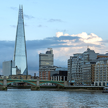 LONDON, ENGLAND - JUNE 17 2016: Twilight on the Thames river and The Shard, London, Great Britain