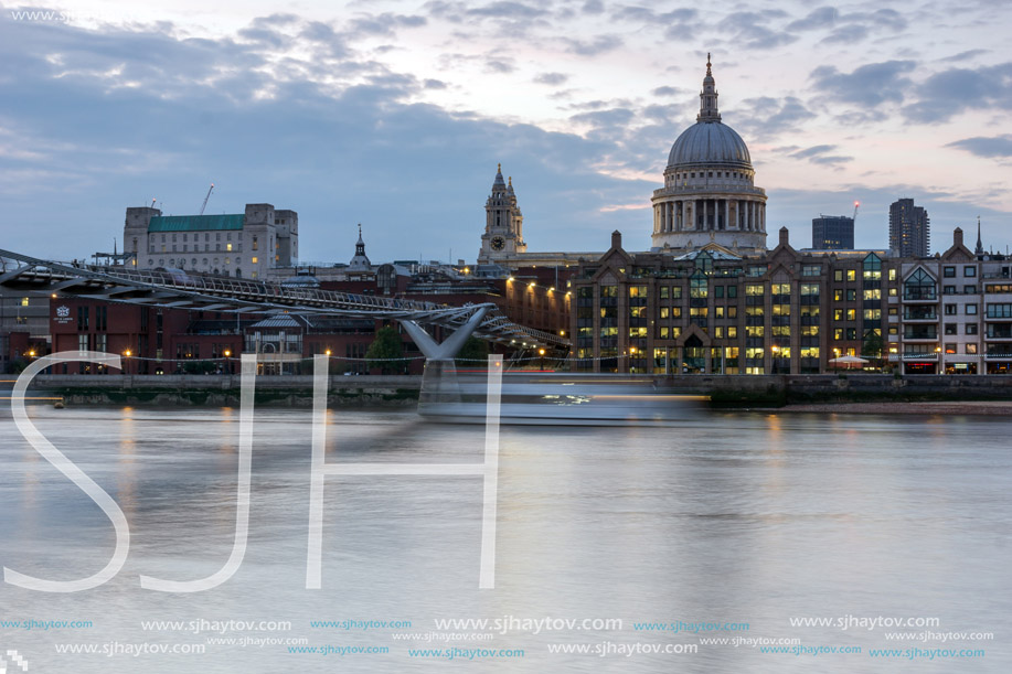 LONDON, ENGLAND - JUNE 17 2016: Night photo of  Millennium Bridge and  St. Paul Cathedral, London, Great Britain