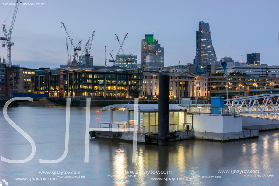 LONDON, ENGLAND - JUNE 17 2016: Night Photo of Thames River and skyscrapers,  London, Great Britain