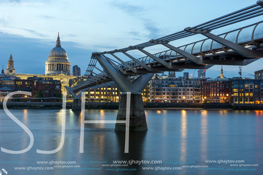 LONDON, ENGLAND - JUNE 17 2016: Night photo of  Millennium Bridge and  St. Paul Cathedral, London, Great Britain
