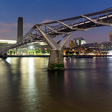 LONDON, ENGLAND - JUNE 17 2016: Night Panorama of Millennium Bridge, Tate Modern Gallery and Thames River, London, United Kingdom