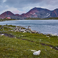 The last rays of the sun over Tevno Lake and Kamenitsa peak, Pirin Mountain, Bulgaria