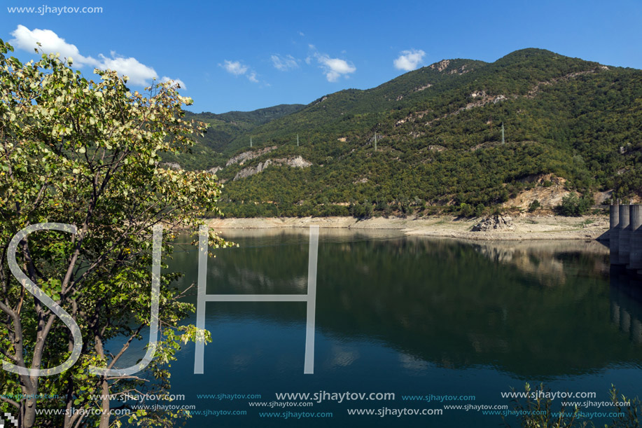 Amazing ladscape with green forest around Vacha (Antonivanovtsy) Reservoir, Rhodopes Mountain, Bulgaria