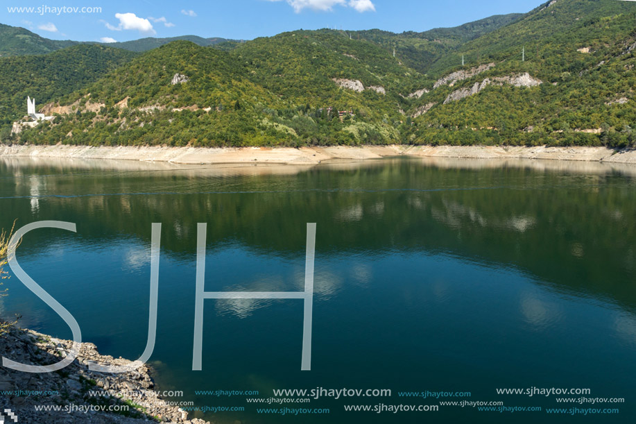 Green forest around Vacha (Antonivanovtsy) Reservoir, Rhodopes Mountain, Bulgaria