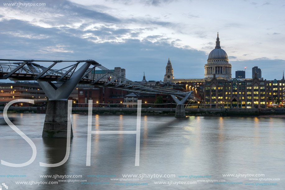 LONDON, ENGLAND - JUNE 17 2016: Twilight panorama of  Millennium Bridge and  St. Paul Cathedral, London, Great Britain