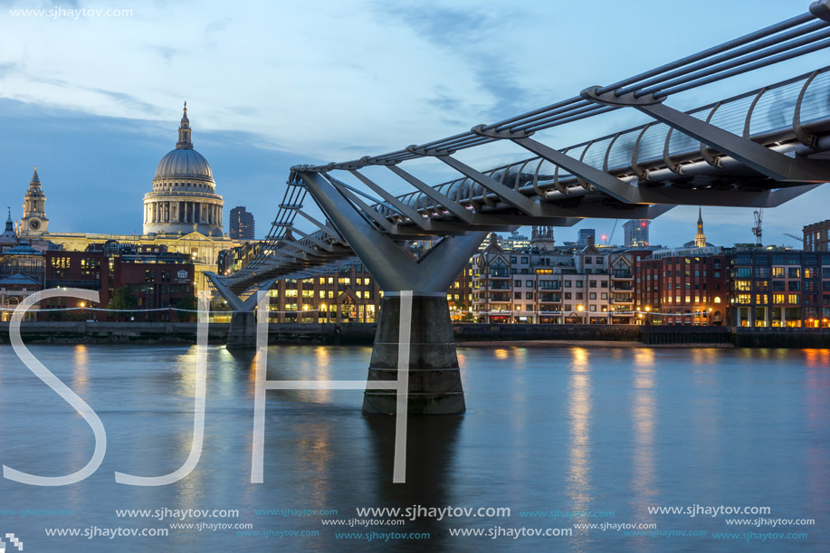 LONDON, ENGLAND - JUNE 17 2016: Night photo of Millennium Bridge and  St. Paul Cathedral, London, Great Britain