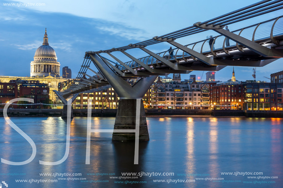 LONDON, ENGLAND - JUNE 17 2016: Night photo of Millennium Bridge and  St. Paul Cathedral, London, Great Britain