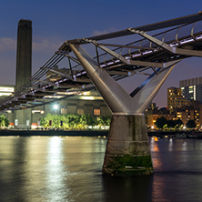 LONDON, ENGLAND - JUNE 17 2016: Night Panorama of Millennium Bridge, Tate Modern Gallery and Thames River, London, United Kingdom