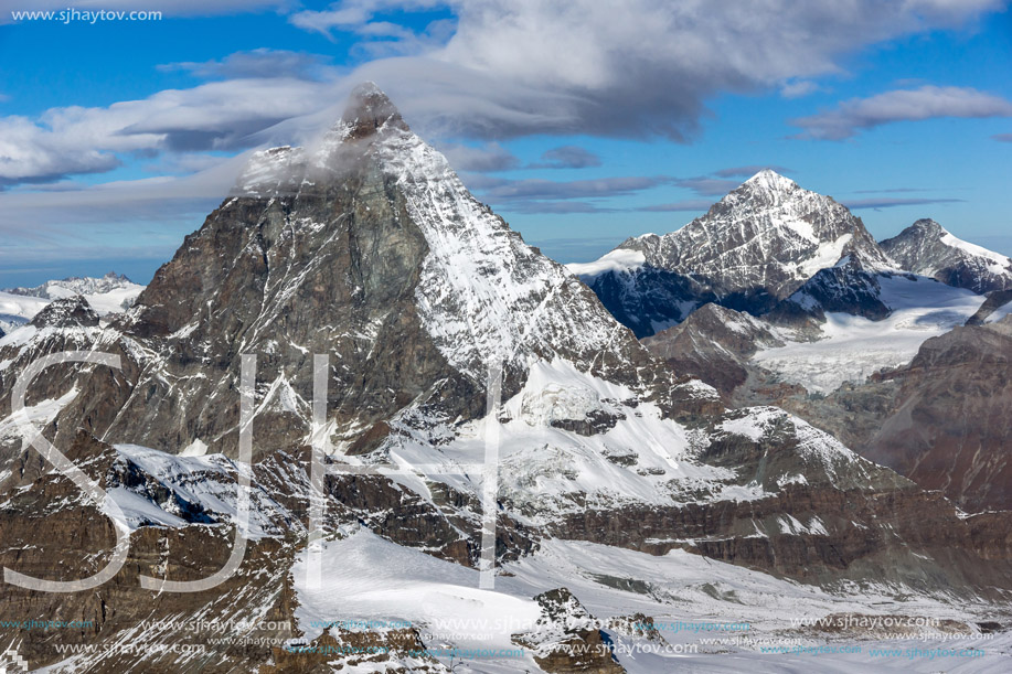 Amazing Panorama of mount Matterhorn covered with clouds, Canton of Valais, Alps, Switzerland