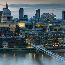 LONDON, ENGLAND - JUNE 18 2016: Night photo of Millennium Bridge, Thames River and  St. Paul Cathedral, London, Great Britain