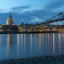 LONDON, ENGLAND - JUNE 18 2016: Night photo of Millennium Bridge, Thames River and  St. Paul Cathedral, London, Great Britain
