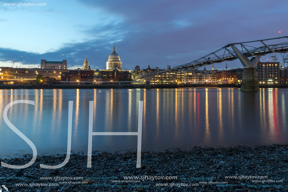 LONDON, ENGLAND - JUNE 18 2016: Night photo of Millennium Bridge, Thames River and  St. Paul Cathedral, London, Great Britain