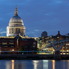 LONDON, ENGLAND - JUNE 18 2016: Night photo of Millennium Bridge, Thames River and  St. Paul Cathedral, London, Great Britain