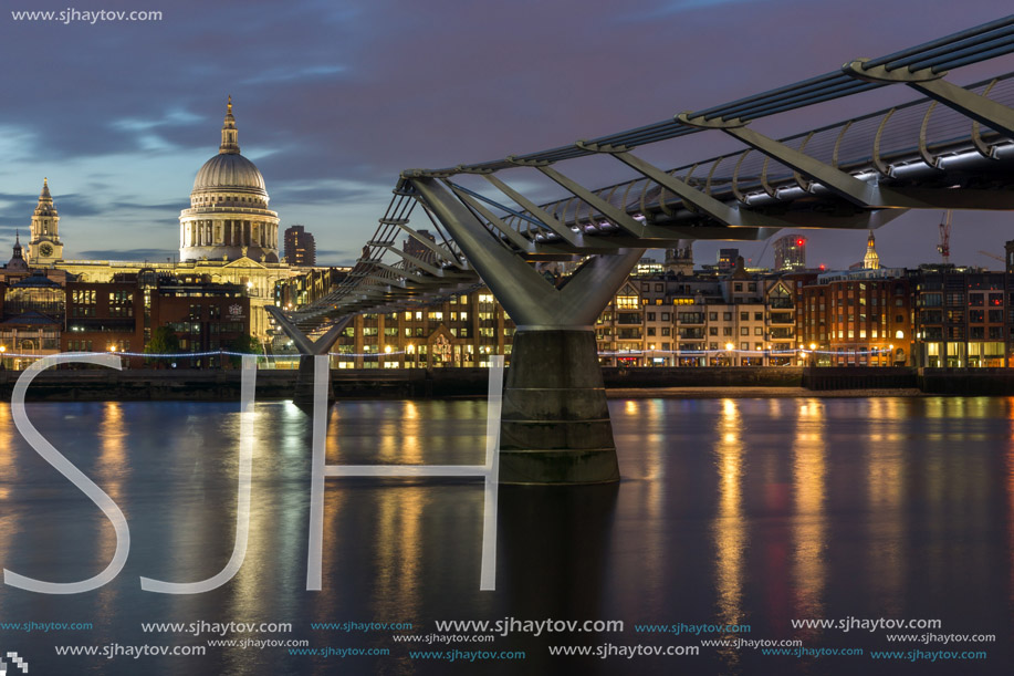 LONDON, ENGLAND - JUNE 18 2016: Night photo of Millennium Bridge, Thames River and  St. Paul Cathedral, London, Great Britain