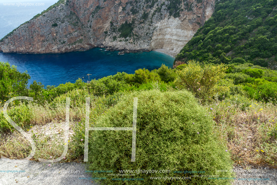 Blue water and rocks of small beach at Zakynthos island, Greece