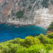 Seascape with Blue water and rocks of small beach at Zakynthos island, Greece