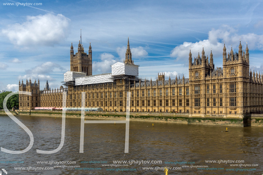 LONDON, ENGLAND - JUNE 19 2016: Cityscape of Westminster Palace and Thames River, London, England, United Kingdom