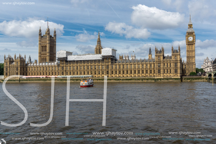 LONDON, ENGLAND - JUNE 19 2016: Cityscape of Westminster Palace and Thames River, London, England, United Kingdom