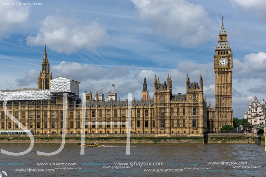 LONDON, ENGLAND - JUNE 19 2016: Cityscape of Westminster Palace and Thames River, London, England, United Kingdom